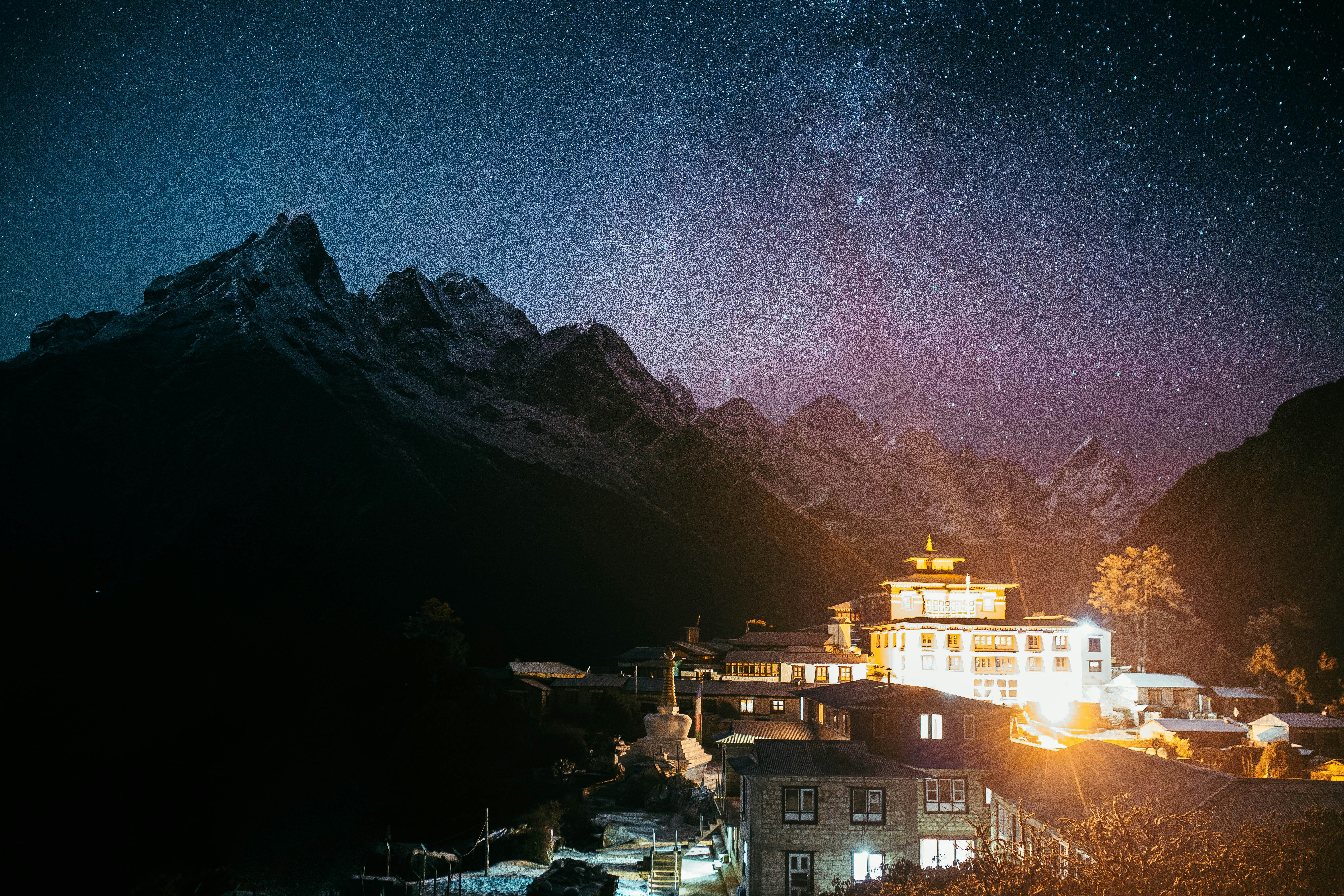 photography of house in front of mountain